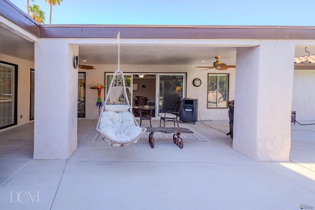 view of patio with ceiling fan