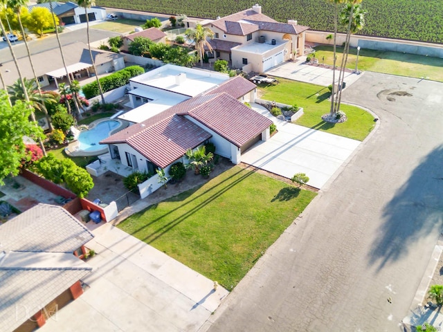 birds eye view of property with a residential view