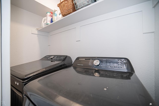 washroom with washer and clothes dryer