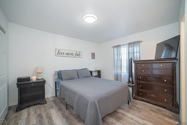 bedroom featuring light hardwood / wood-style flooring