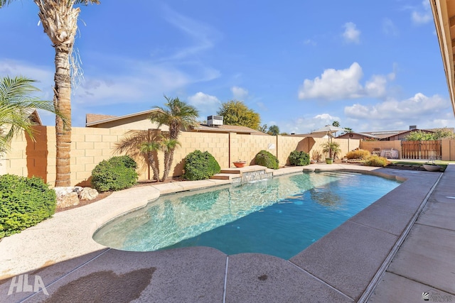 view of swimming pool with a fenced backyard and a fenced in pool