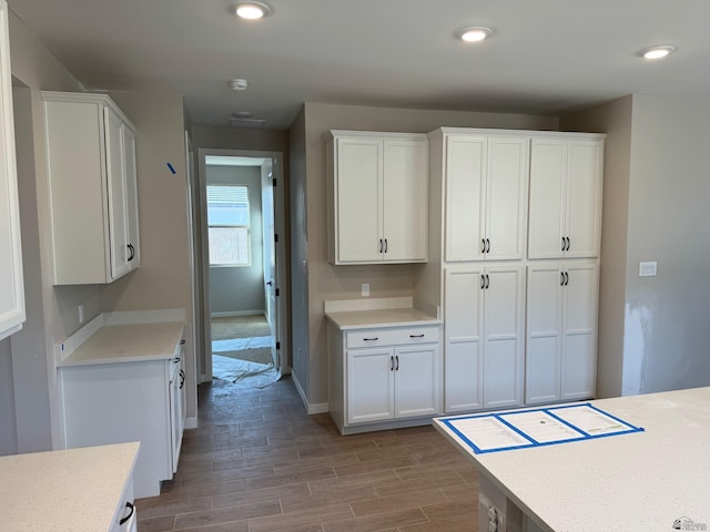 kitchen featuring white cabinetry