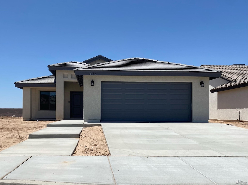 view of front of home featuring a garage