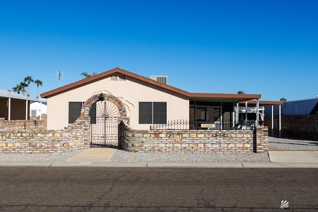 view of front of house with a carport