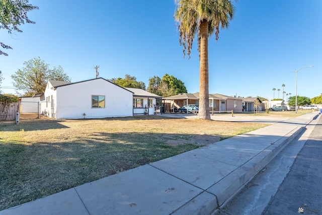 view of front facade with a front lawn