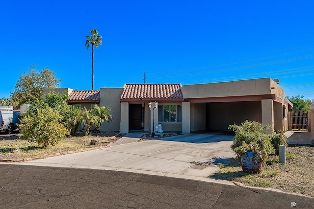 view of front of house with a carport