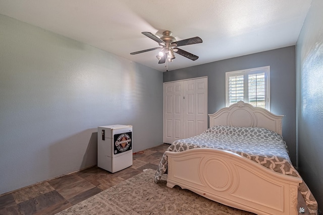 bedroom with a closet and ceiling fan