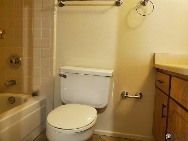 full bathroom with vanity, toilet, and tiled shower / bath combo