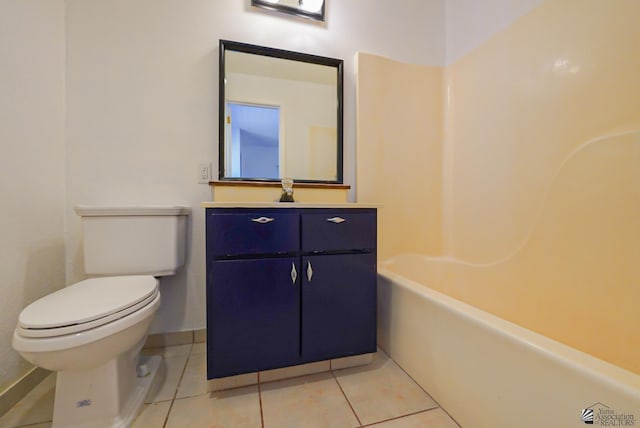 bathroom featuring toilet, tile patterned floors, and vanity