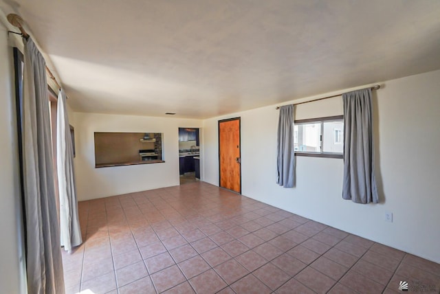 view of tiled spare room