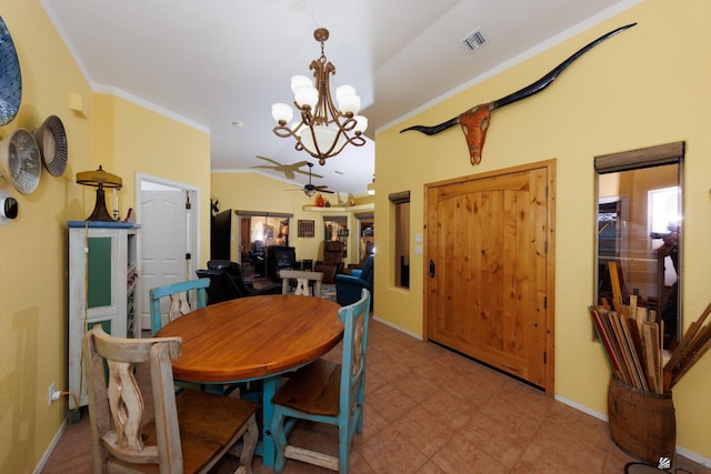 dining space with crown molding, ceiling fan with notable chandelier, and vaulted ceiling