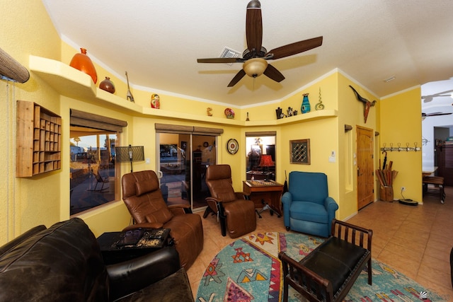 tiled living room featuring crown molding and ceiling fan