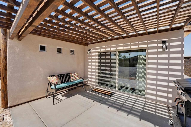 view of patio featuring a pergola