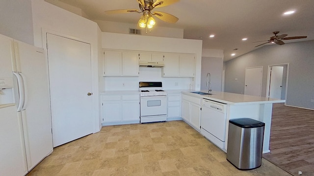 kitchen with white appliances, visible vents, a peninsula, under cabinet range hood, and a sink