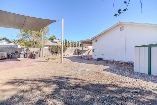 view of yard with a patio area and fence