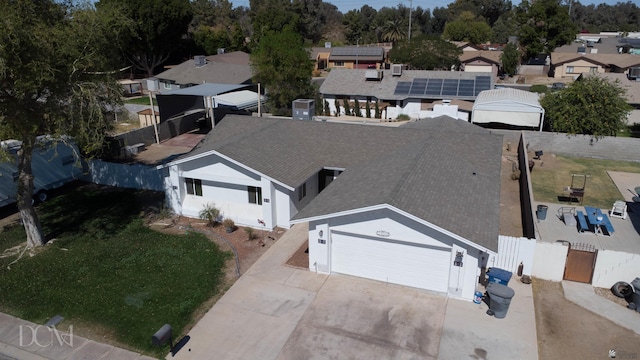 birds eye view of property with a residential view