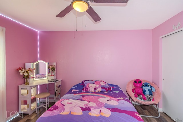 bedroom featuring ceiling fan and wood finished floors