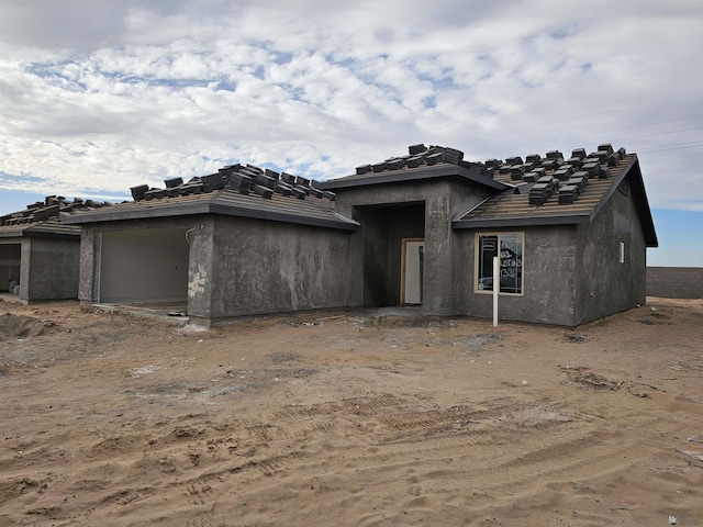 property under construction featuring stucco siding