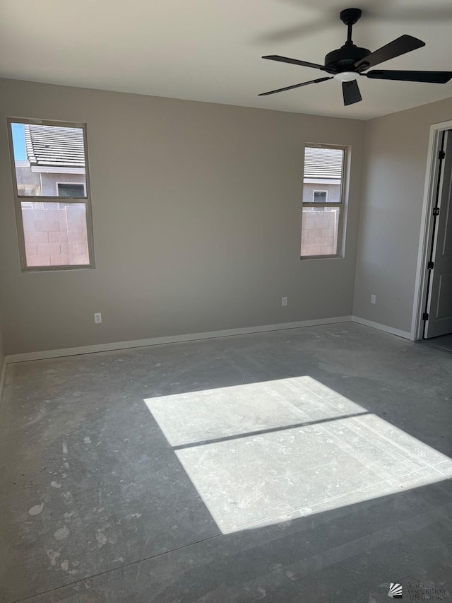 empty room featuring ceiling fan