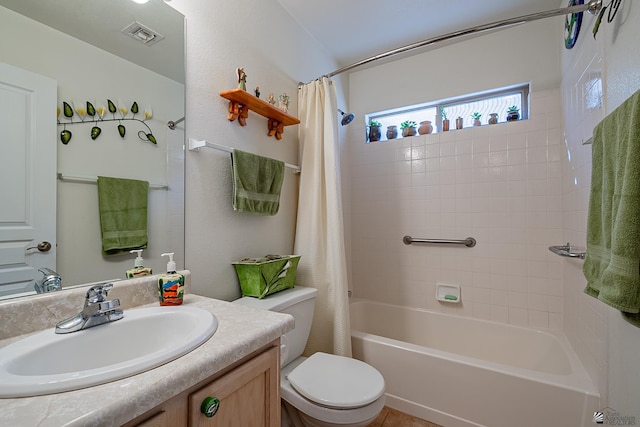 full bathroom featuring toilet, shower / tub combo, and vanity