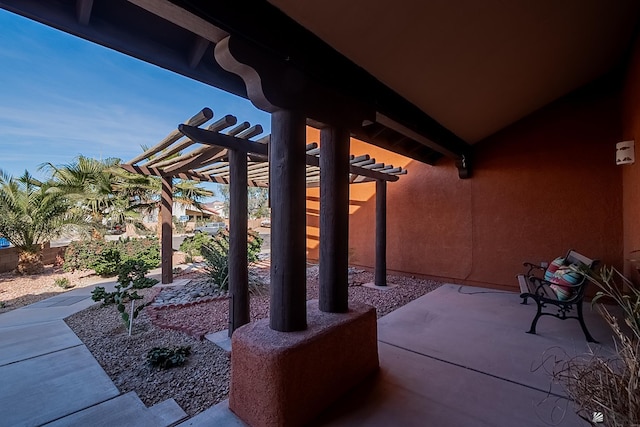 view of patio featuring a pergola