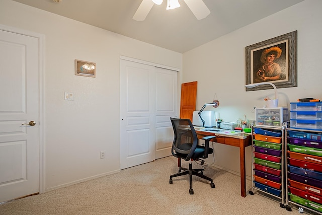 carpeted office with ceiling fan