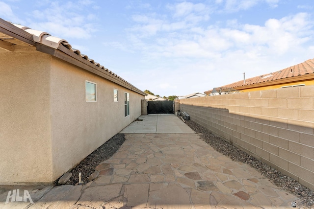 view of home's exterior featuring a patio area