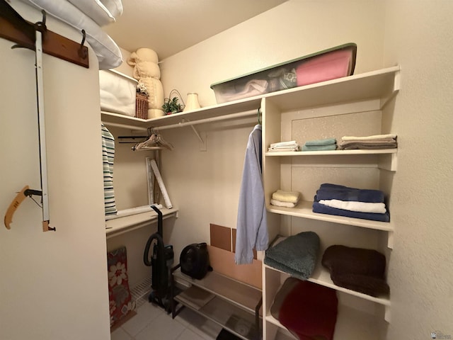 walk in closet featuring tile patterned floors