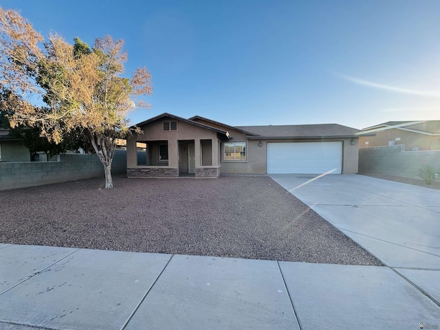 view of front of property with a garage