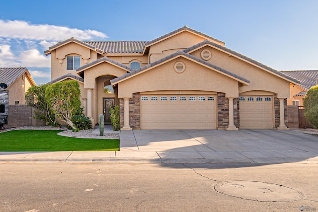 mediterranean / spanish-style home featuring a garage