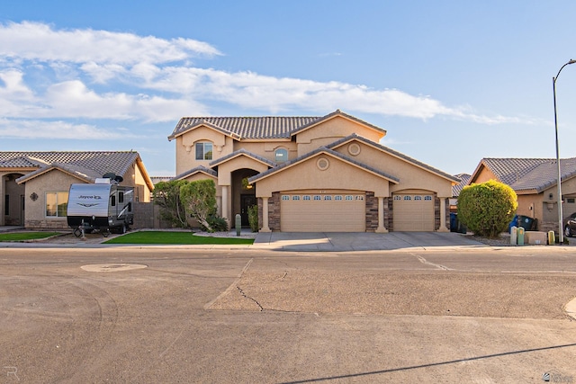 mediterranean / spanish-style house featuring a garage