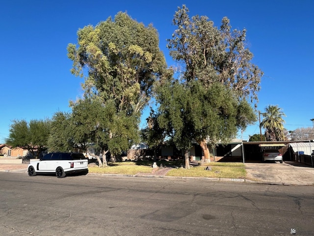 view of front of home with a carport