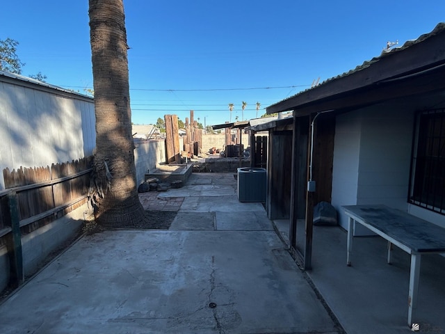 view of patio with central AC