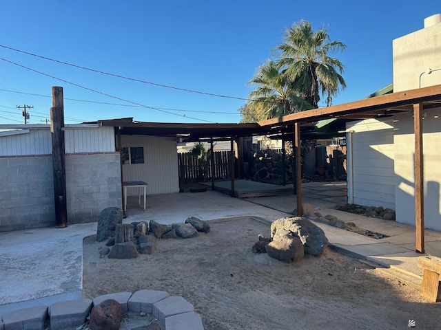 exterior space with a carport