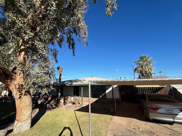 exterior space featuring a carport