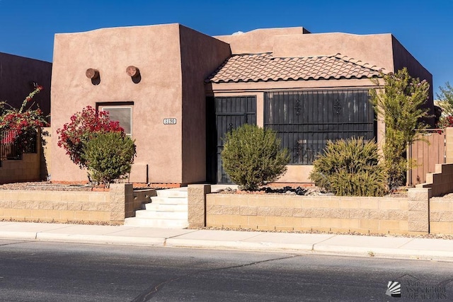 view of pueblo revival-style home