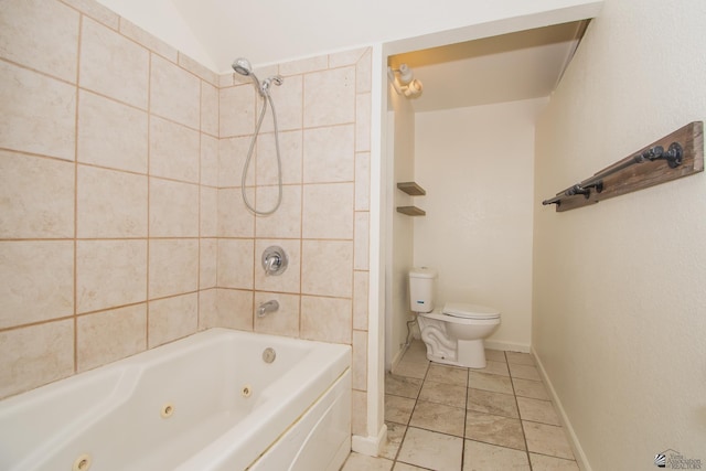 full bathroom featuring tile patterned flooring, a combined bath / shower with jetted tub, baseboards, and toilet