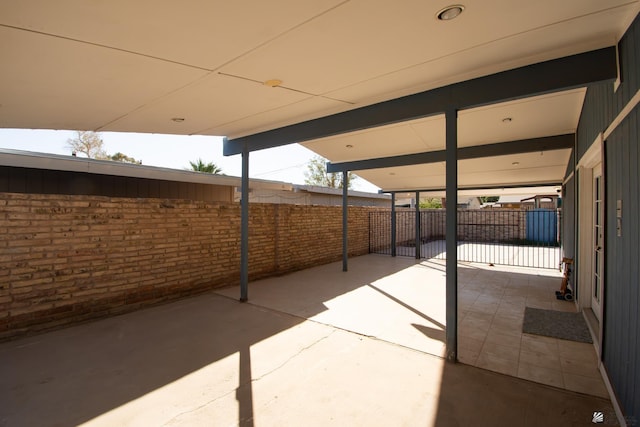 view of patio featuring fence