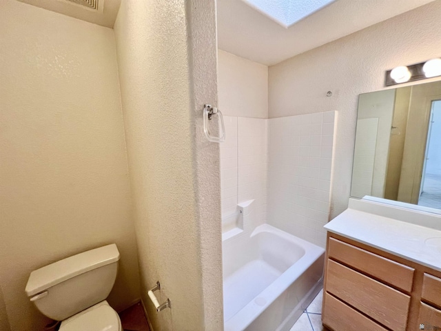 full bathroom with vanity, bathtub / shower combination, and toilet