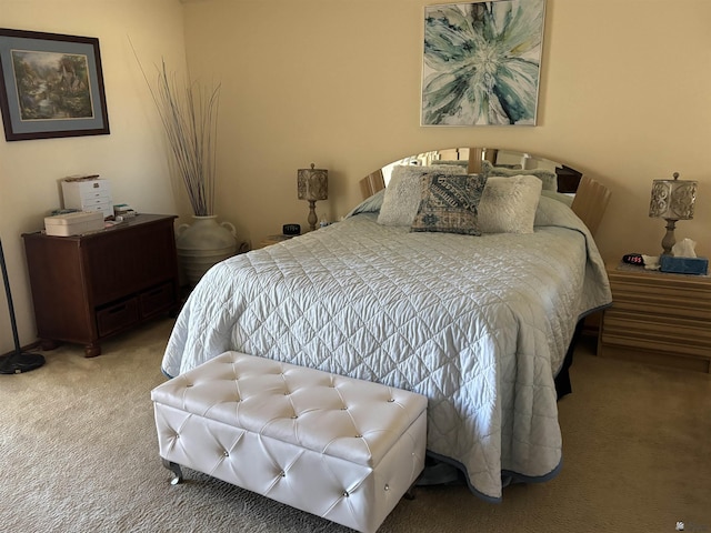 carpeted bedroom featuring a textured ceiling