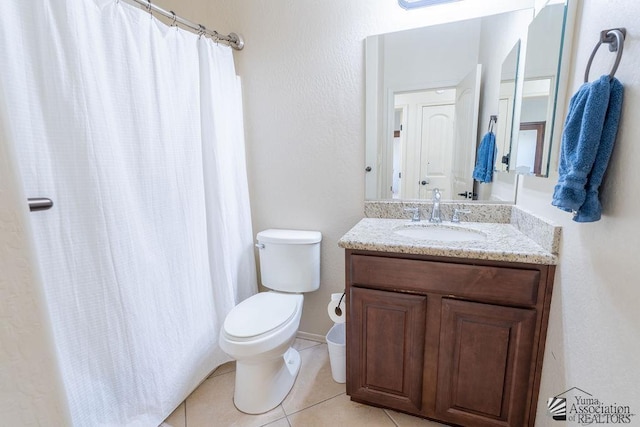 full bathroom featuring curtained shower, vanity, toilet, and tile patterned floors