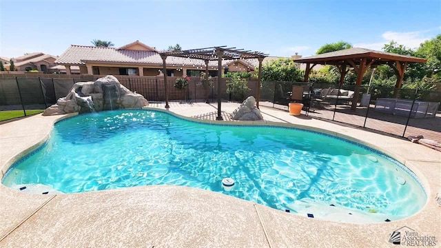 view of swimming pool featuring a patio area, fence, and a fenced in pool