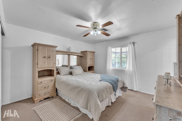 bedroom with baseboards, a ceiling fan, and light colored carpet