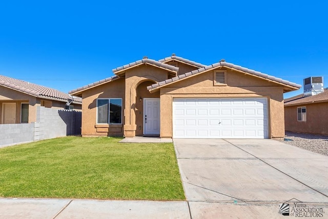 ranch-style house with an attached garage, fence, concrete driveway, stucco siding, and a front lawn