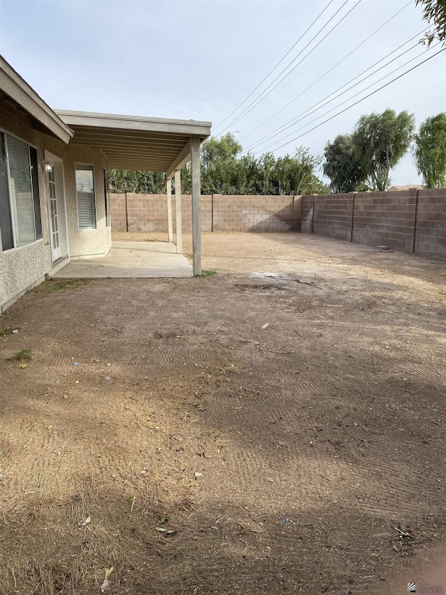 view of yard with a patio area