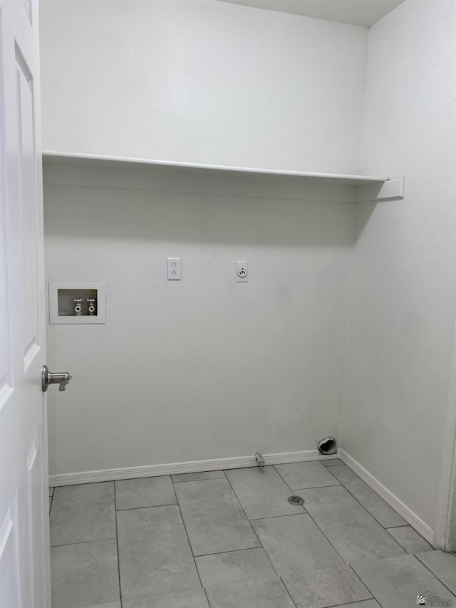 laundry room featuring electric dryer hookup, hookup for a gas dryer, hookup for a washing machine, and light tile patterned floors