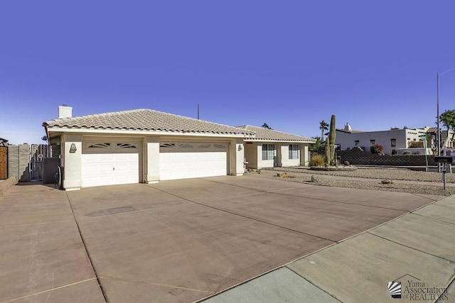 view of front of property with a garage