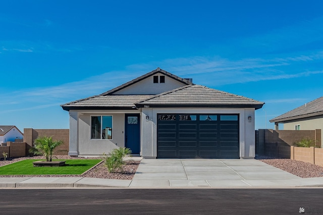 view of front of home with a garage