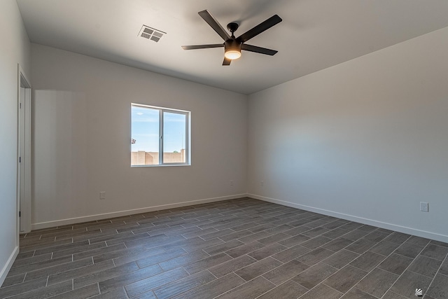 unfurnished room with ceiling fan