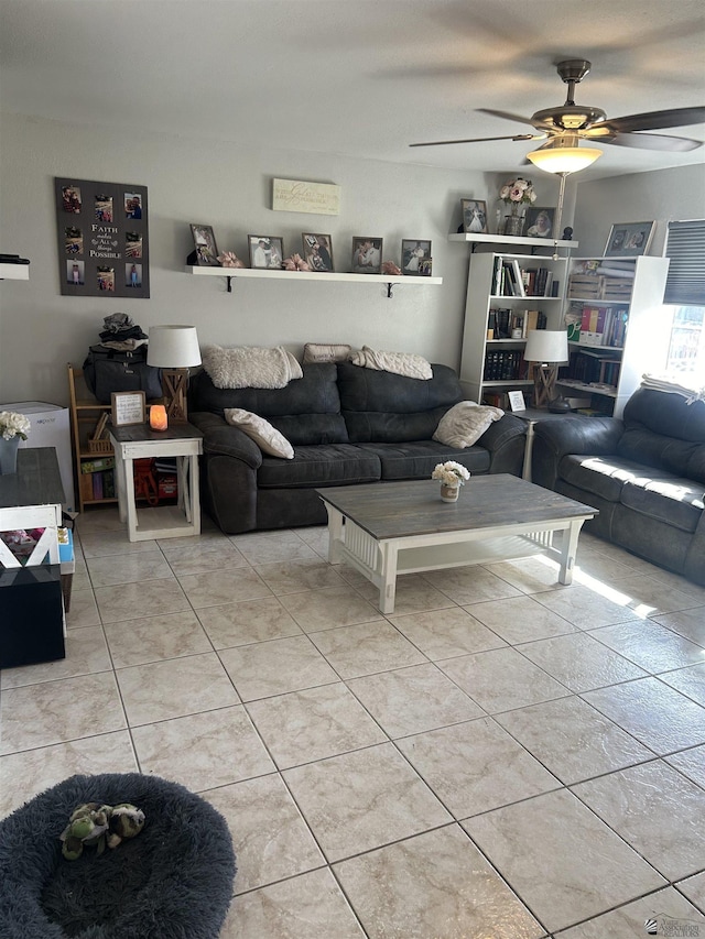 living room featuring ceiling fan and light tile patterned floors